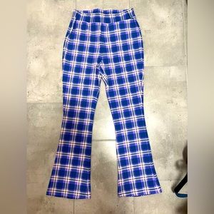 Flared tight pants in purple funky check from Delia’s